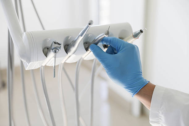 Professional Emergency Dentist technician working in Houston County County, GA